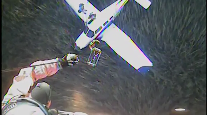 U.S. Coast Guard hoists two people to safety after small plane crashes in South Carolina near Georgia border. Dec. 7, 2024.
