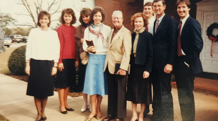 Faith Fuller, far left, and her family pose with Jimmy and Rosalynn Carter outside Maranatha Baptist Church in Plains, Ga.,, circa 1986. Fuller would attend Carter's Sunday school classes there in his post-presidency years.