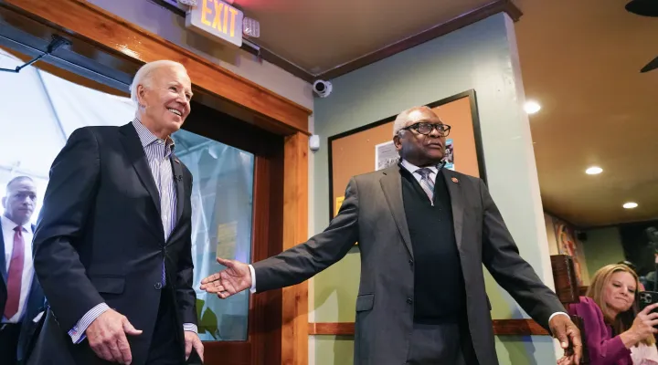 President Joe Biden, with Rep. Jim Clyburn, D-S.C., arrives at Hannibal's Kitchen in Charleston, S.C., Monday, Jan. 8, 2024 to meet and interact with diners. Earlier in the day, Biden delivered remarks at Mother Emanuel AME Church in Charleston, where nine worshippers were killed in a mass shooting by a white supremacist in 2015.