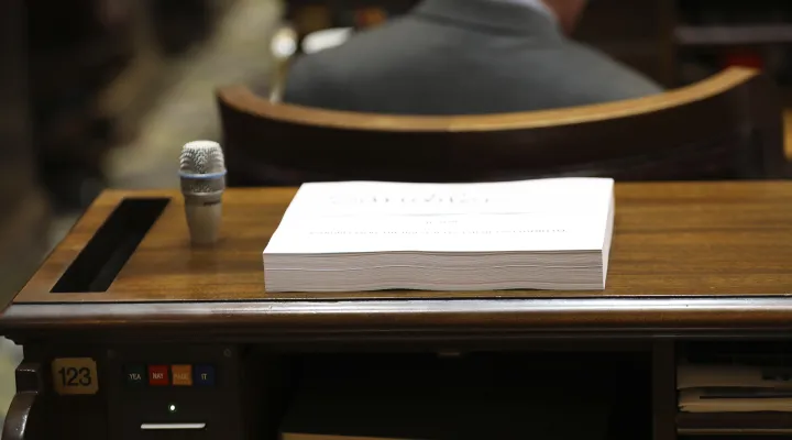 A copy of the South Carolina House's 2024-25 budget sits on the desk of a member on Tuesday, March 5, 2024, in Columbia, S.C. (AP Photo/Jeffrey Collins)