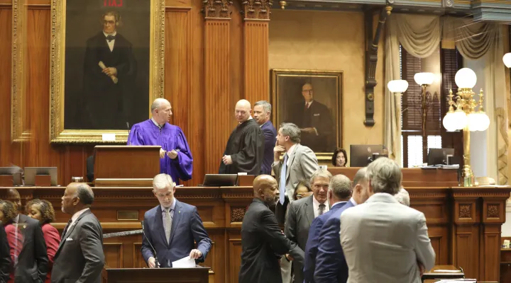 South Carolina senators talk after the Senate took a recess following comments from Sen. Tom Fernandez on Tuesday, March 4, 2025, in Columbia, S.C. (AP Photo/Jeffrey Collins)