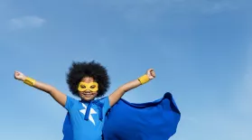 Girl dressed as a superhero 