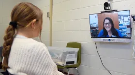 CareSouth Carolina Telehealth Nurse Practitioner Staci Cassidy meets virtually with a student at McBee Elementary School. 