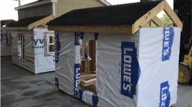 Students in the BOOM Program learned construction techniques by building small houses. 